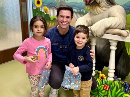 Dr Mitchell Loeb with patients Dr Mitchell Loeb with patients