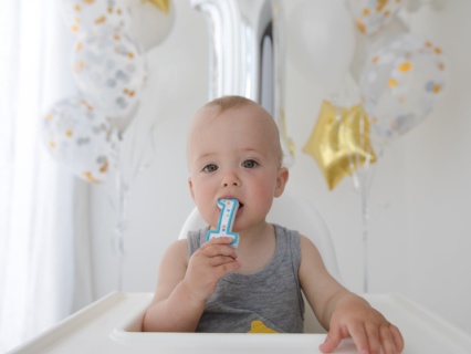 kid-grins-schedule-first-dental-visit kid-grins-schedule-first-dental-visit